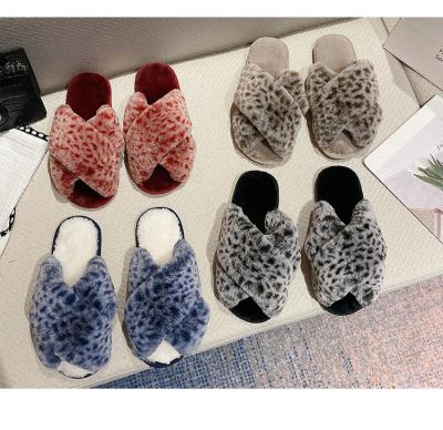 China Large size female leopard print slippers fashion trend plush plush cross slippers home comfort cotton slippers for sale