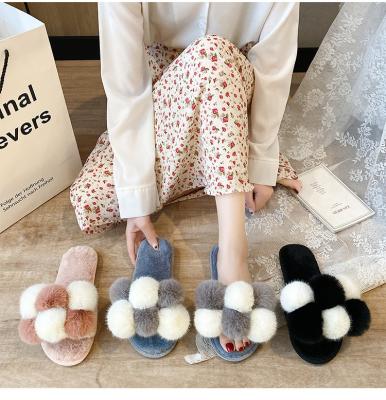 China 2021 Autumn And Winter New Style Color Ball Flat Open Toe One Word Plus Size Hairy Slippers Female Fashion Trend Hair Ball Cotton Slippers for sale