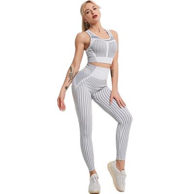 China Breathable Seamless Yoga Wear Leggings Fitness Two-Piece Hip-Lifting Bra Set Running Yoga Set For Woman for sale