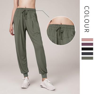 China High Waist Breathable Loose Sport Pants Naked Yoga Pants Women Running Sports Fitness Pants Women Yoga Clothes Sportswear With Pocket for sale