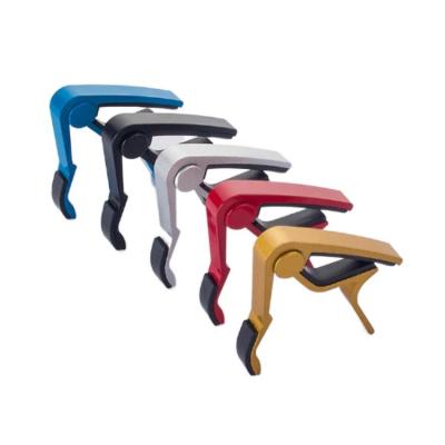 China GUITAR Various Colors Wholesale Price Aluminum Material Strong Pick Guitar Capo With Pick Rack for sale