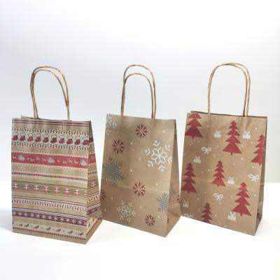 China Recyclable high quality paper gift bag twisted h andle carry bag with handle for Christmas gift for sale