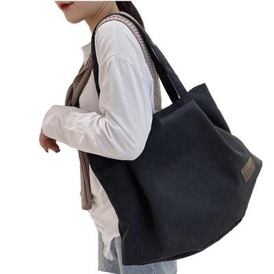 China Normcore/Minimalist Washed Canvas Handbag Shoulder Bag Classic Large Capacity Large Student Storage Travel Tote Shoulder Bag for sale