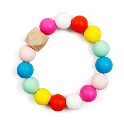 China Soft Toy Baby Toys Rattles With Wooden Ball Teether And Shakers Food Grade Safe Silicon Beaded Strap Teether for sale