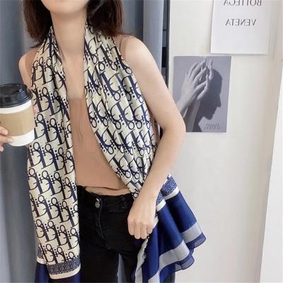 China Daily life fast delivery couturier TOP letter D printed bawal satin silk shawl for women scarf wholesale hijab along for sale