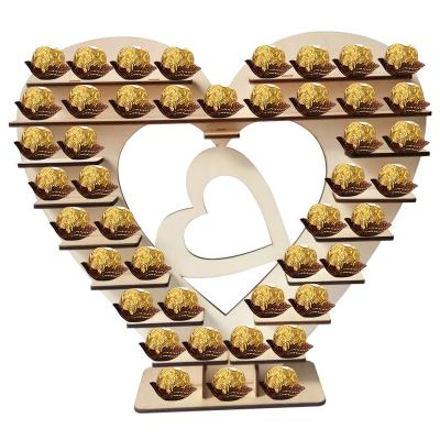 China Europe Chocolate Candy Heart Shaped Snacks Display Shelf For Birthday Wedding Centerpiece Decorations Wooden Crafts for sale