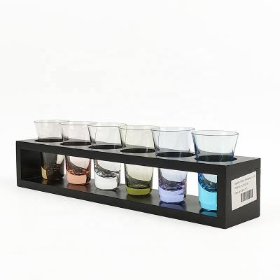 China Popular Design Custom Wooden Stand Party Use Spirit Tumbler with Colored Bottom Set of 6 Soda Lime Glass Shot Glasses for sale