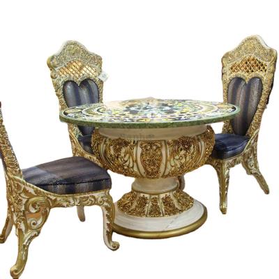 China Classic European Carved Gold Carved Wooden Round Dining Table With Chairs For Arabic Royal Turkey Dining Room Furniture Sets for sale