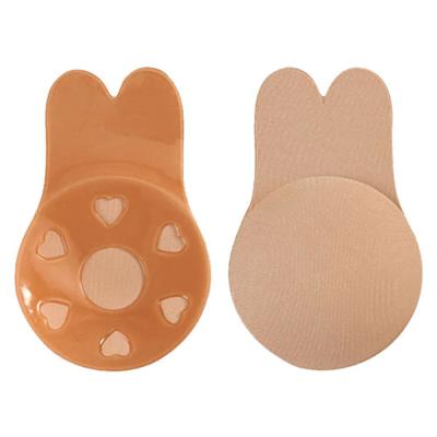 China Women's One-Piece Intimate Accessories Adhesive Strapless Backless Stick On Bra Silicone Rabbit Shape Nipple Cover Invisible Lift Up Bra for sale