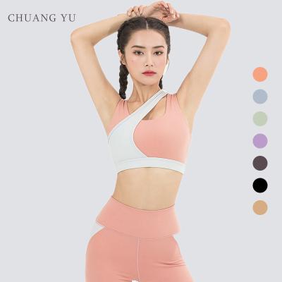 China Other Color Sports Gym Sleeveless Neck Clash Tie Up Elastic Yoga Vest For Ladies for sale