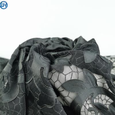 China New hot sale eyelet eyelet eyelet dress style embroidery fabric laser embroidery high quality black leather fabric Breathable Tulle for sale