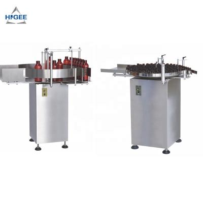 China Food Turntable with Round Bottle Labeling Machine Automatic Labeler Liquid Filling Machine with Glass Bottle and PET for sale