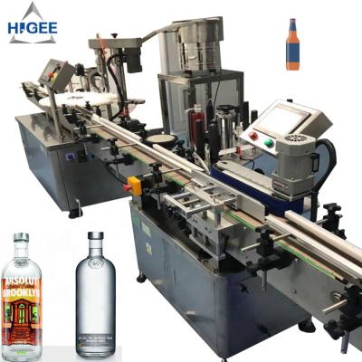 China APPAREL 2 in 1 glass bottle liquor filling capping machine with vodka filling machine, wine bottle filling machine with liquor filler for sale