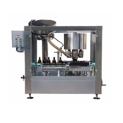 China HIGEE Beverage Capsule Machine With Vodka Cap Whiskey Capsule Bottling Machine Line for sale