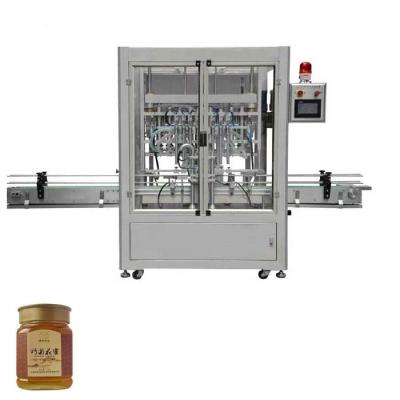 China Natural Food Honey Bottling Machine Honey Pet Jars Filling Capping And Labeling Machine Line for sale