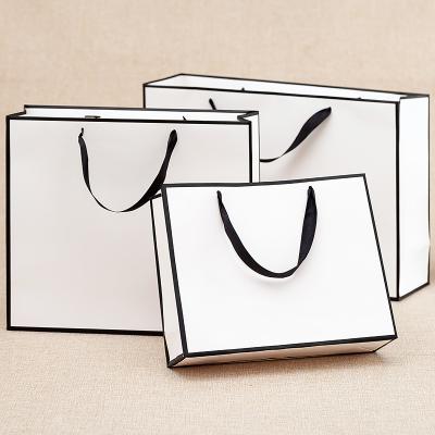 China Luxury Recycled Materialsa Fashion Gift Shopping Paper Bags Custom Printing Cosmetics With Button Paper Gift Bags for sale