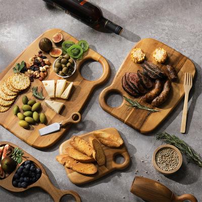 China Woodsun Large Circle Sustainable Design Cutting Board Acacia Wood Wood With Ring for sale