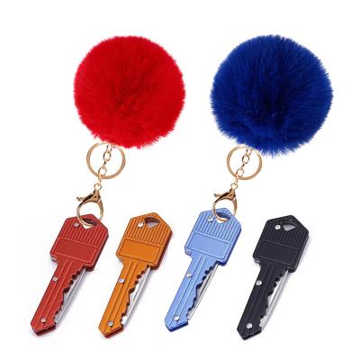 China Portable Custom Anti-wolf Multi Self-defense Female Logo Key Chain Color Fashion Key Chain for sale