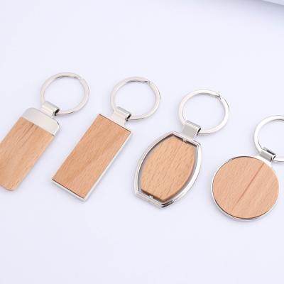 China Promotional Gift Logo Wooden Blanks Keychain With Metal Promotion Gift Wholesale Printing Wood Pendant for sale