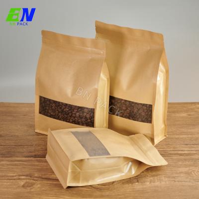 China Good Quality Barrier Nuts Packaging Stand Up Kraft Paper Zipper Bags A Clear Window Paper Pouch for sale