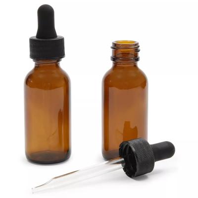 China Cosmetic 30ml 50ml 1oz 1.7 ounce Amber Glass Bottles with glass droppers for essential oils and perfumes for sale