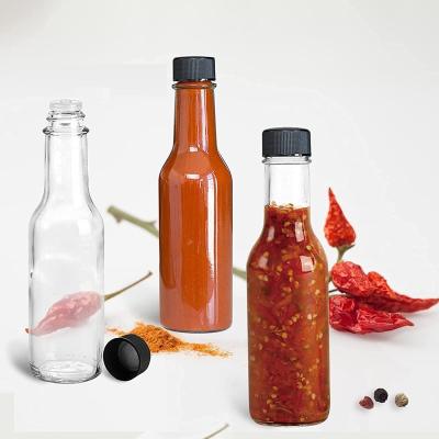 China Food 5 Ounce Clear Glass Daze Bottles Mini Hot Sauce Bottles Empty With Lids Small Beverage Wine Bottles Canning Olive Oil Packaging for sale