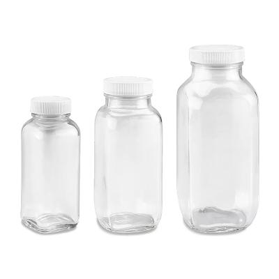 China Wholesale Empty Glass Square 500ML 250ml Milk Beverage / Juice / Tea / Drinks Bottle With Lid for sale