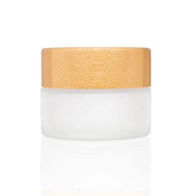 China Wholesale 5g 15g 30g 50g 100g Cosmetic Empty Frosted Glass Cosmetic Jar With Bamboo Lid For Cream for sale