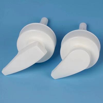 China Flip No. 48-410 Ribbed White Lotion Pump Lock Down Head With Custom Dip Tube for sale