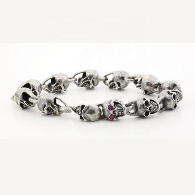 China Vintage Punk Jewelry Multiple Skulls 925 Sterling Silver Bracelet For Men Customize Rock Bracelet for sale