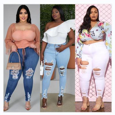 China Xl-5xl fashion breathable new style in stock plus size wholesale jeans for fat women ripped jeans women for sale