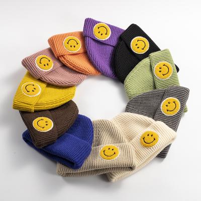 China 2021 Autumn Winter JOINT Accessories Smile Face Hat Ear Protector Wool Knitted Multicolor Warm Hat for sale