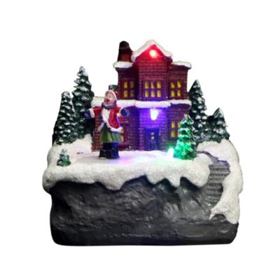 China Country Houses Artificial Snow Crafts Resin Ornaments Christmas Village Set Lead Resin With Music for sale