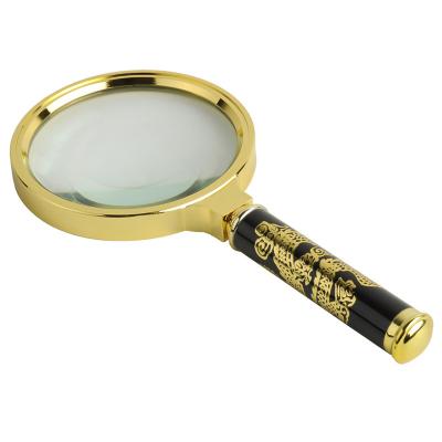 China Factory direct sales plastic + glass lens various specifications of dragon handle multiple handheld magnifier, metal handle handheld magnifier for sale