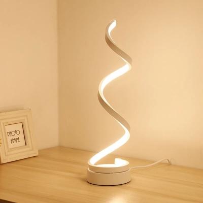 China Creative Modern Simple Modern Bedroom Bedside Table Eye Protection Table Lamp LED Reading Light For Home Curved Table Lamp for sale