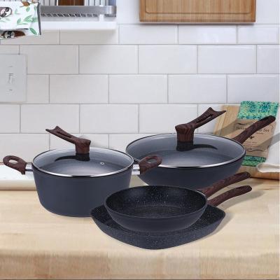 中国 Sustainable Cookware Set Forged Kitchenware Sauce Pan Frying Pan Aluminum Casserole Set Bakelite Non-Stick Marble Coated Handle 販売のため