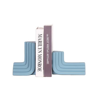 China Home Decoration L Shape Bookends 2021 Simple Bookends Desktop Ornament New Storage Bookshelves Color White Bookends for sale