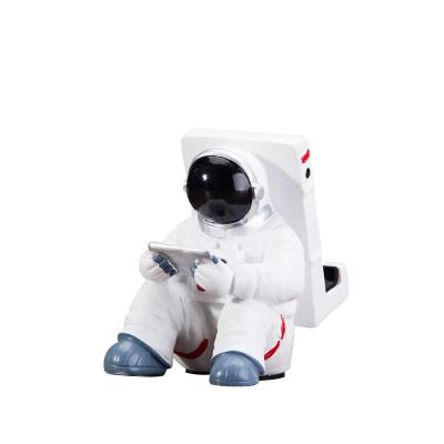 China Creative Lazy Desktop Astronaut Artifact Phone Stand Astronaut Shape Phone Stand Mobile Phone Holder Wholesales for sale