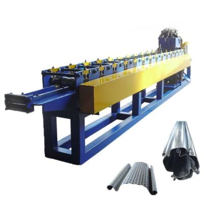 China 85mm XHH JM85 combined automatic steel sheet door roll shutter slate shape machine for sale