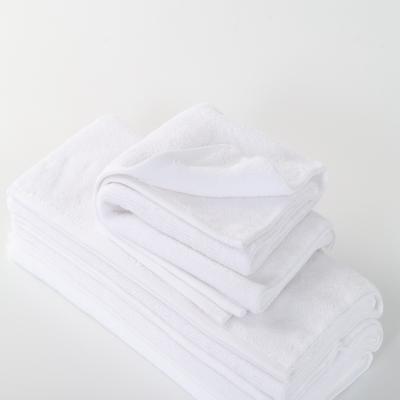 China Custom Designer Logo Towel Luxury Cotton 100% Sustainable Hotel Hand Towel White Bath Towel for sale