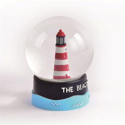 China Europe Resin Lighthouse Snow Globe, Glass Beacon Water Globe For Home Decoration for sale