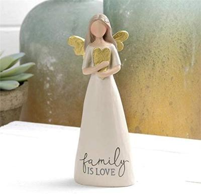 China Africa Family Is Sweet Of Love Heart Cream Stone Angel 6 Inch Resin Collectible Figurine for sale