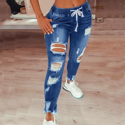 China Newcomers I976 QUICK DRY fashion skinny light blue denim pants ripped distressed women jeans for sale