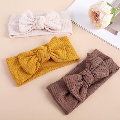 China Soft Newborn Ribbed Headband Baby Style Cloth Headband Baby Large Hair European and American Newborn Bow Tie Elastic Top Headband for sale