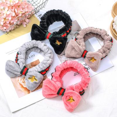 China 2021 New Bowknot 2021 New Bee Hairband Hairband Wholesale Makeup Wash Face Hairband Elegant Cute Gold Embroidery for sale