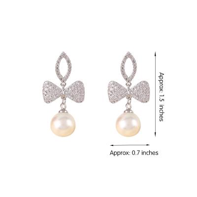 China Factory Wholesale Romantic Imitation Fashion Jewelry Stud Pearl Bowknot Beautiful Unique Design For Women Gift Zircon Party for sale