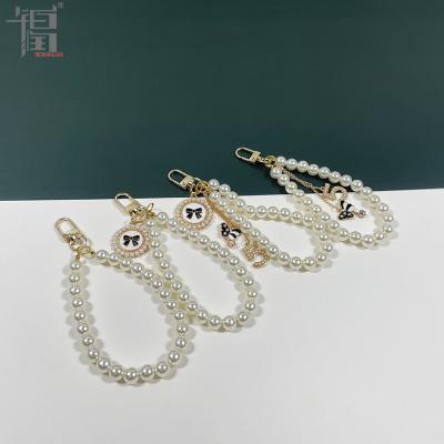 China Fashion Designer Chain For Bags Polished Luxury Gold Chain With Pearl Bead Bag Chain for sale