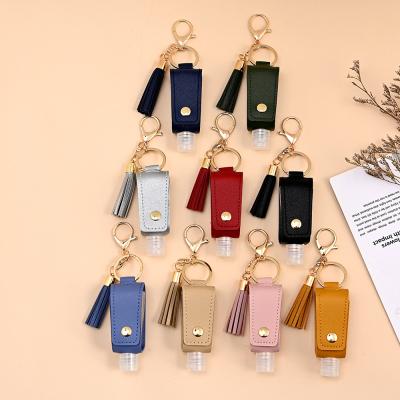 China New Design Veijer Decoration Perfume Hand Wash Refillable Sanitizer Pad Leather Key Chain With Tassel for sale