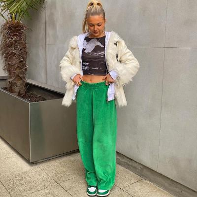 China Anti-wrinkle solid color loose lace up rhude waist pants string pants high waist pants pockets green wide leg pants for sale