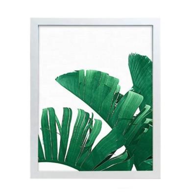 China Environmental friendly solid wood photo frame made into simple photo table family picture frame small hanging wall frame for sale